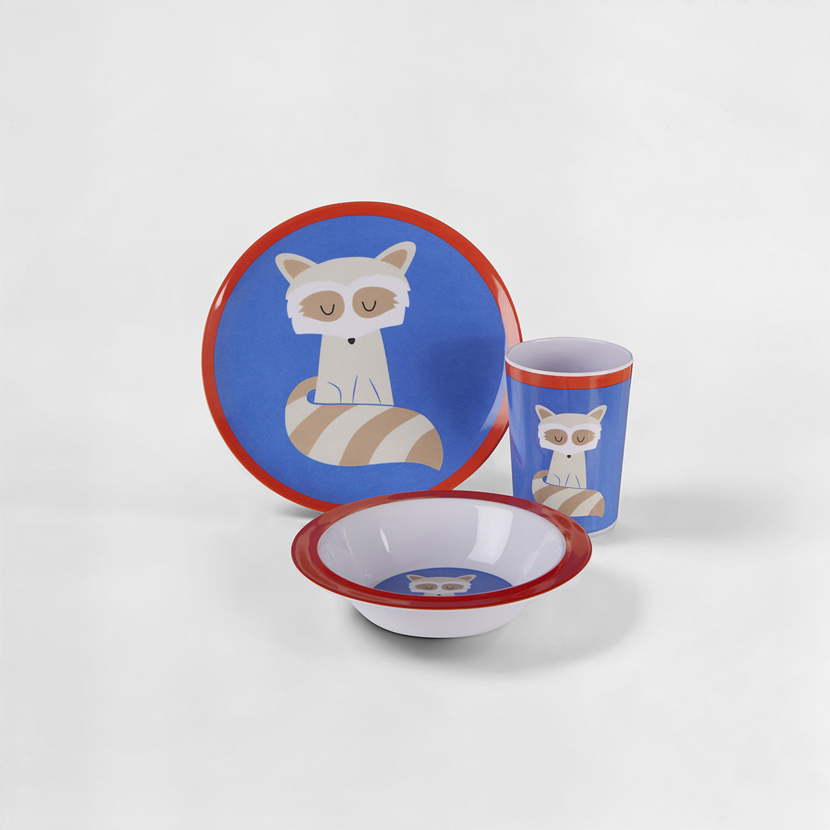 Children's tableware set with raccoon design on a white background