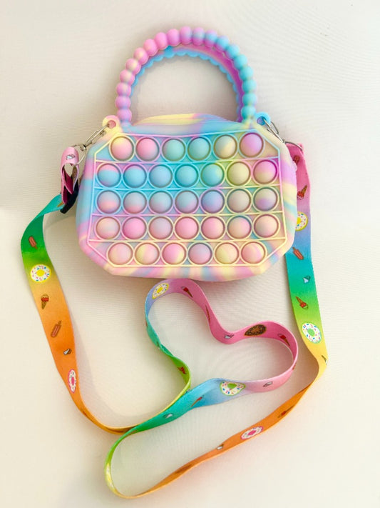 Colorful pop-it bag with a handle on a light background