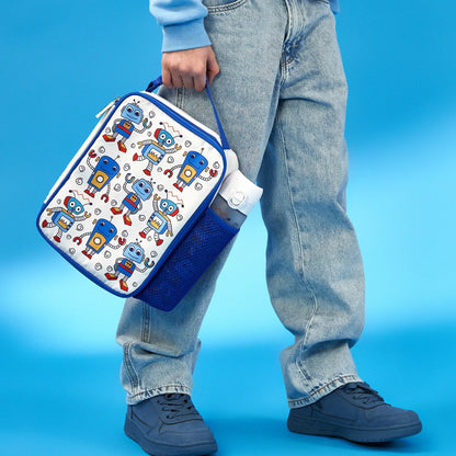 Person holding a lunch bag with robot pattern against a blue background